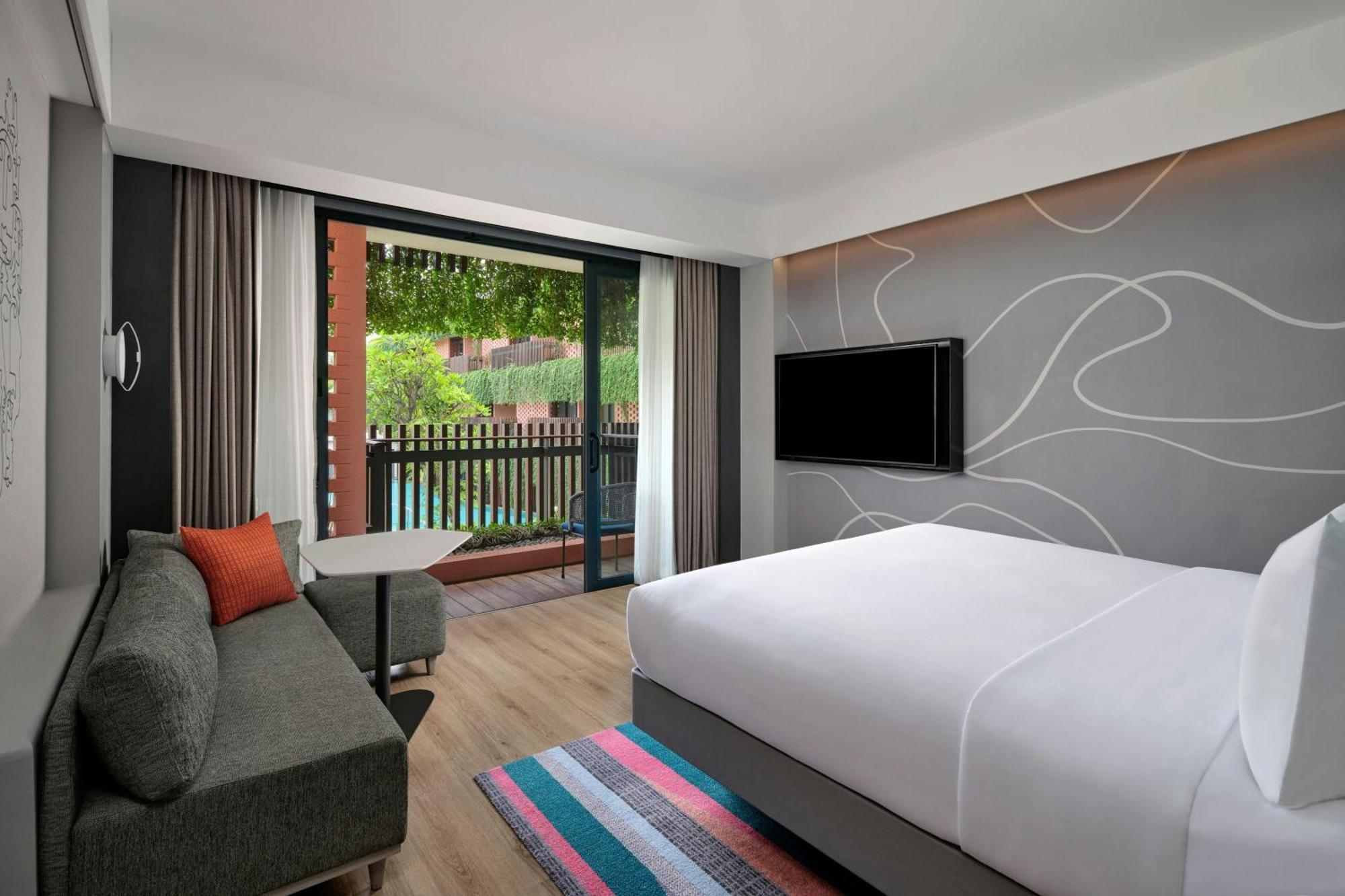 Aloft Pool View 1 King Bed capacity Fun Activities